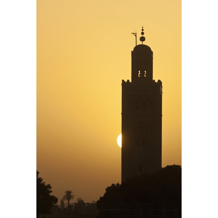 Morocco Sun setting behind minaret of Koutoubia mosque; Marrakesh Poster Print Image 1