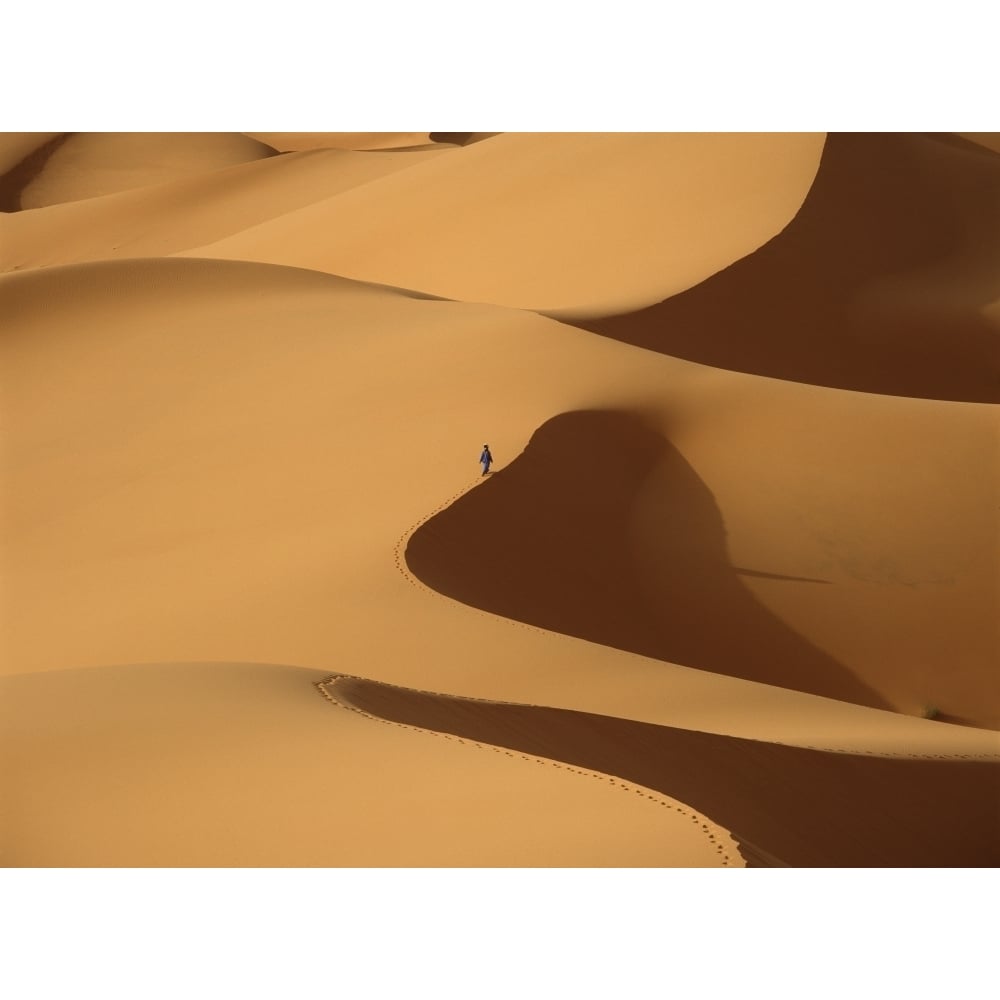 Morocco Berber blue man walking through sand dunes in Erg Chebbi area; Sahara Desert near Merzouga Print Image 1