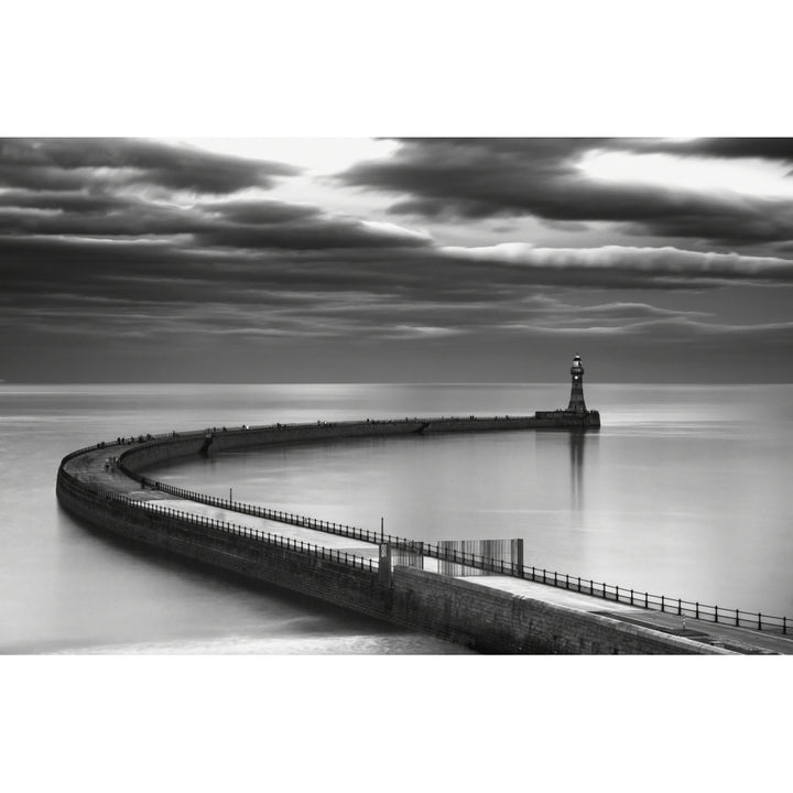 A curving pier with a lighthouse at the end;Sunderland tyne and wear england Poster Print Image 2