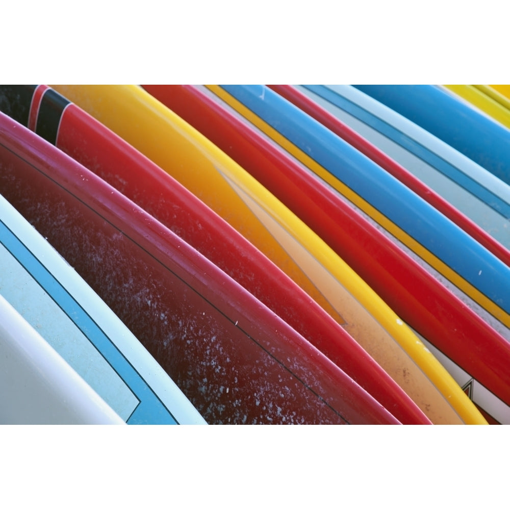 Close up of coloured surfboards lined up; Honolulu Oahu Hawaii United States of America Poster Print Image 1