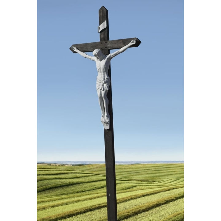 A crucifix on farmland;Saskatchewan canada Poster Print Image 1