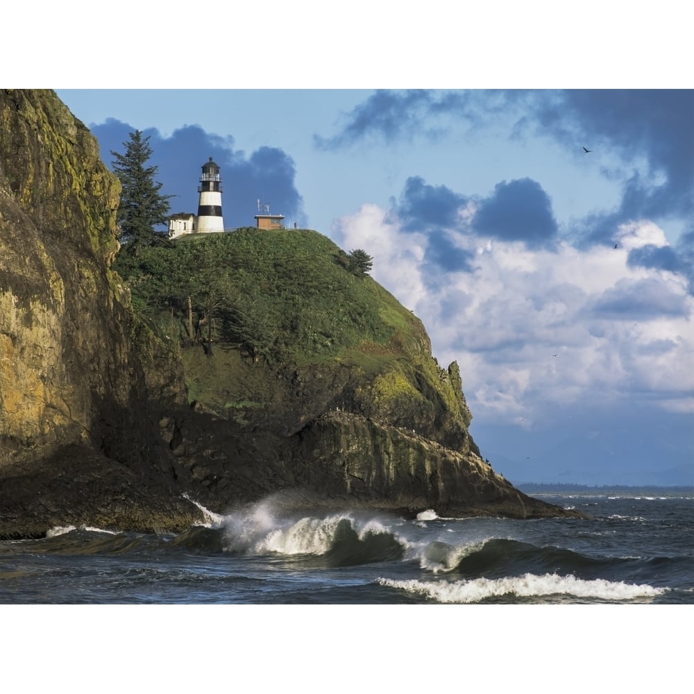 Waves break at Cape Disappointment Lighthouse; Ilwaco Washington United States of America Poster Print Image 1