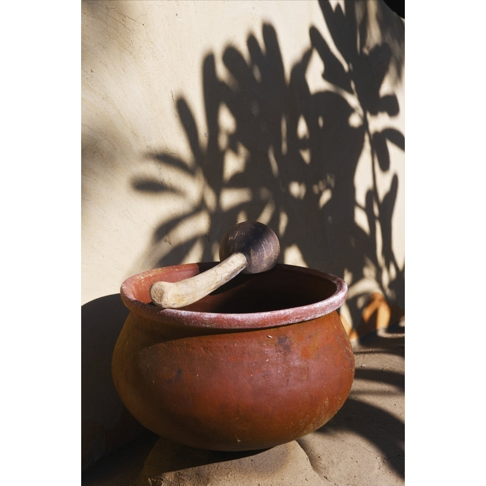 A clay bowl and wooden tool; Ulpotha Embogama Sri Lanka Poster Print Image 1