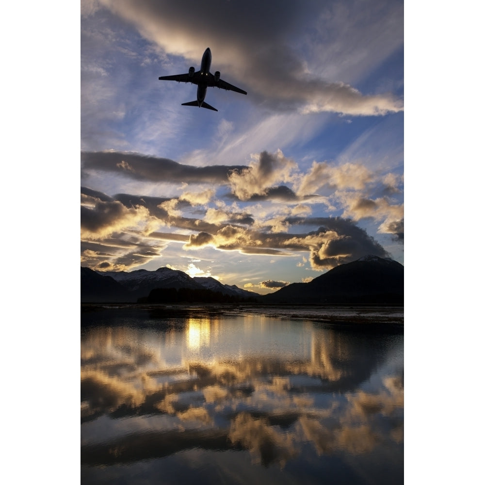 Alaska Airlines jet takes off from Juneau International airport at dawn Juneau Alaska. Poster Print Image 2