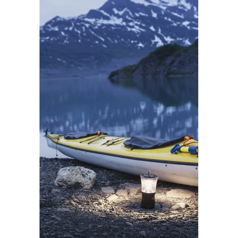 Kayak and lantern on the beach with mountains in the back ground at dusk Shoup Bay State Marine Park Prince William So Image 1