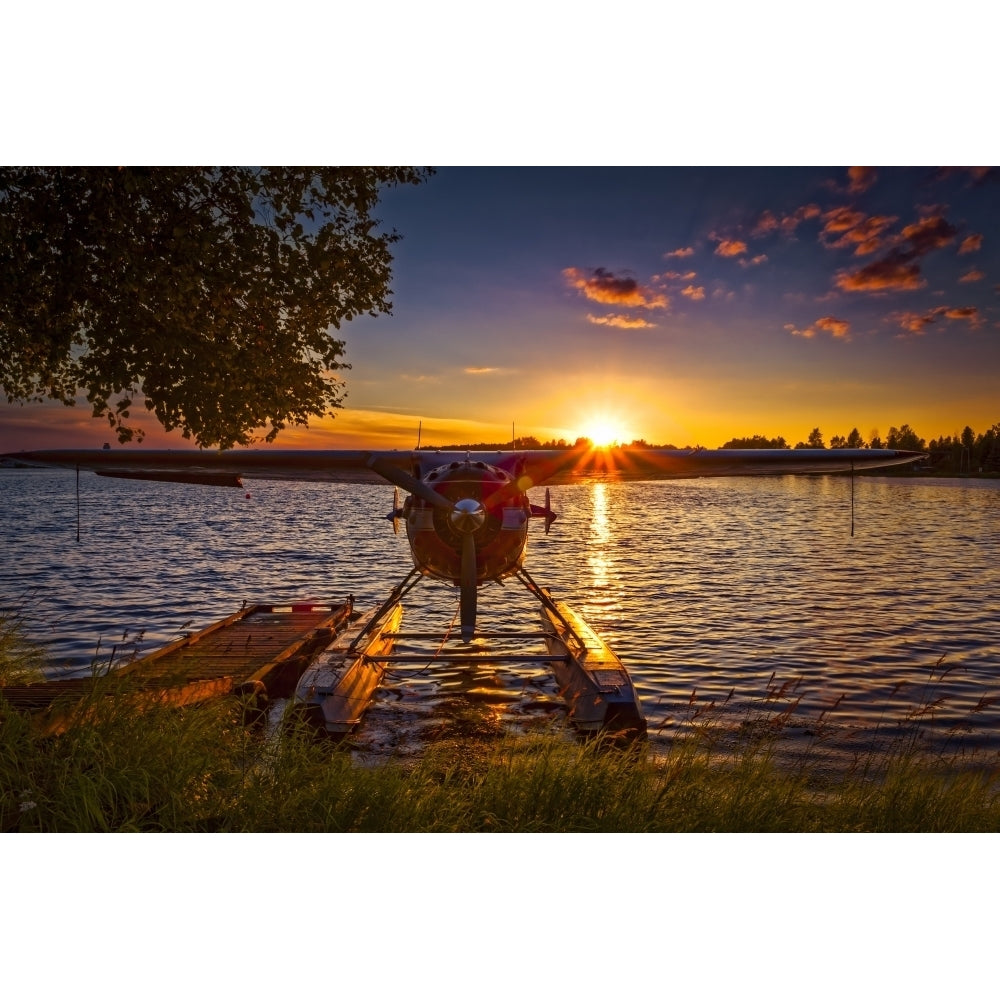 Sunset behind a float plane at Lake Hood Seaplane Base South-central Alaska in summertime; Anchorage Alaska United Image 1