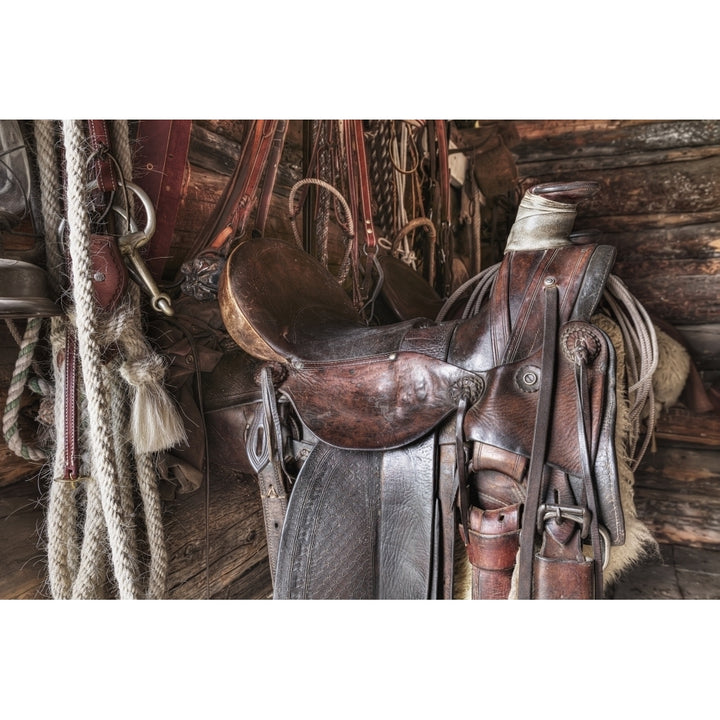 Saddle and horseback riding equipment at Bar U Ranch National Historic Site; Longview Alberta Canada Print Image 1