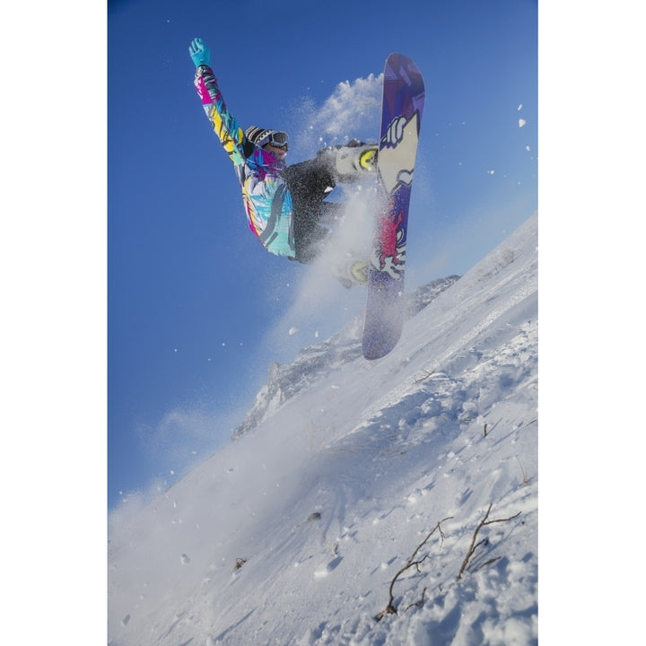 Native Alaskan youth snowboarding in Anaktuvuk Pass Gates of the Arctic National Park Brooks Range Arctic Alaska Post Image 1