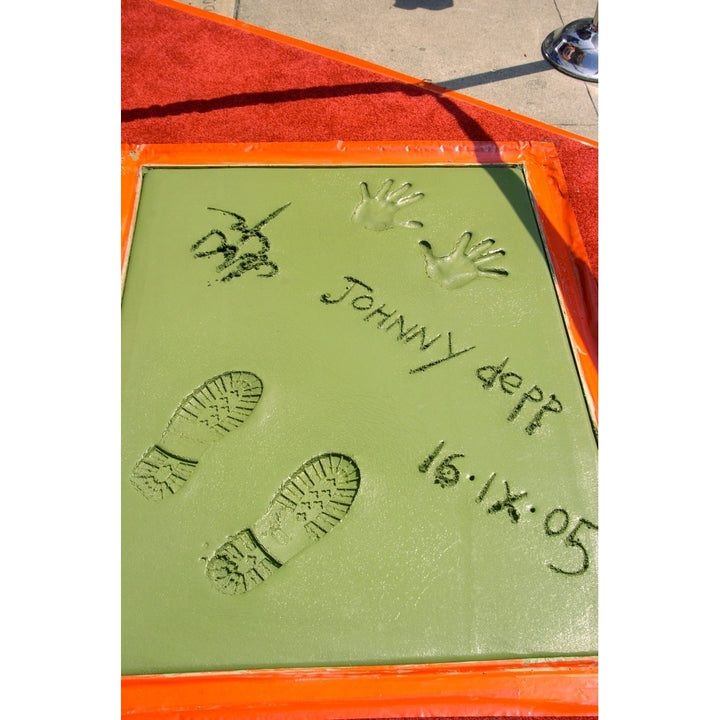 Johnny Depp Hand And Footprint At The Press Conference For Handprint and Footprint Ceremony For Johnny Depp GraumanS Image 1