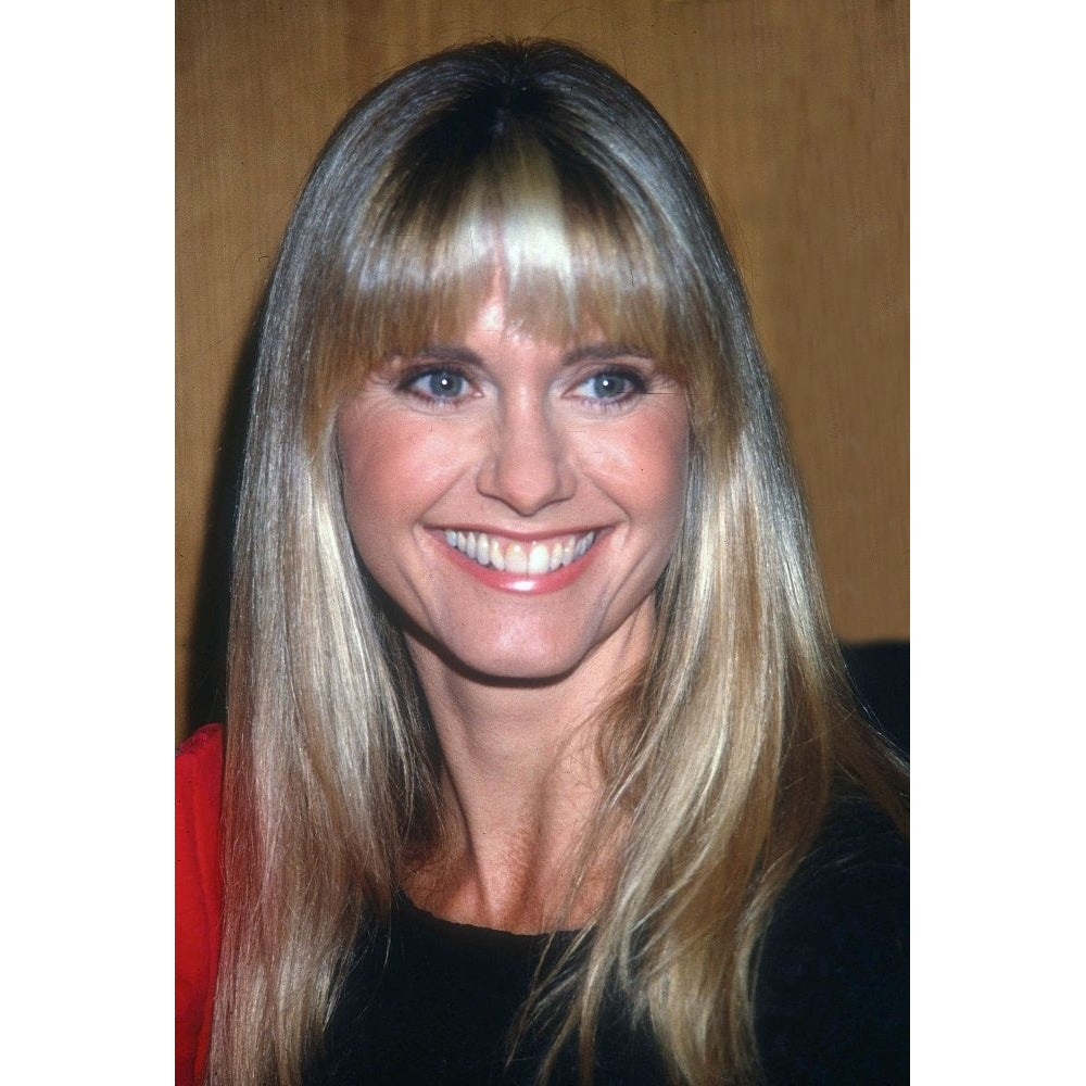 1990 FILE PHOTO. York NY Olivia Newton-John. Photo by Adam Scull Poster Print Image 1