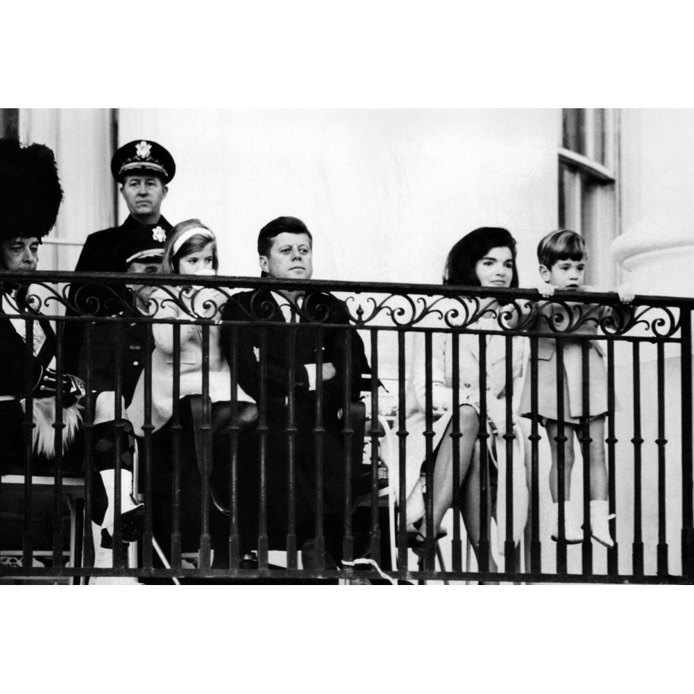 John F. Kennedy Jr. Gets A Closer Look At The Famed Black Watch Pipe And Drum Corps. Behind Image 2