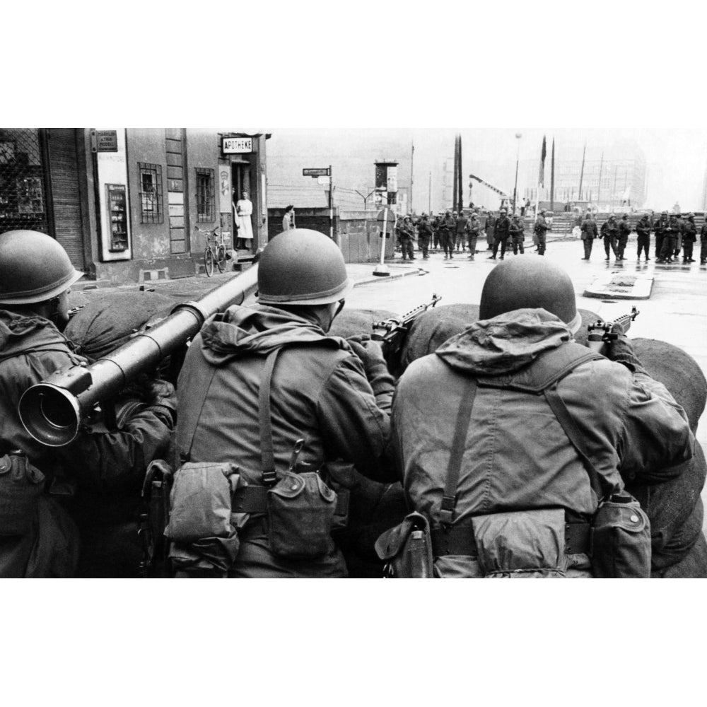 American Troops Face East Berlin Behind Sandbags At Checkpoint Charlie At Friedrichstrasse In West Berlin. In The Image 1