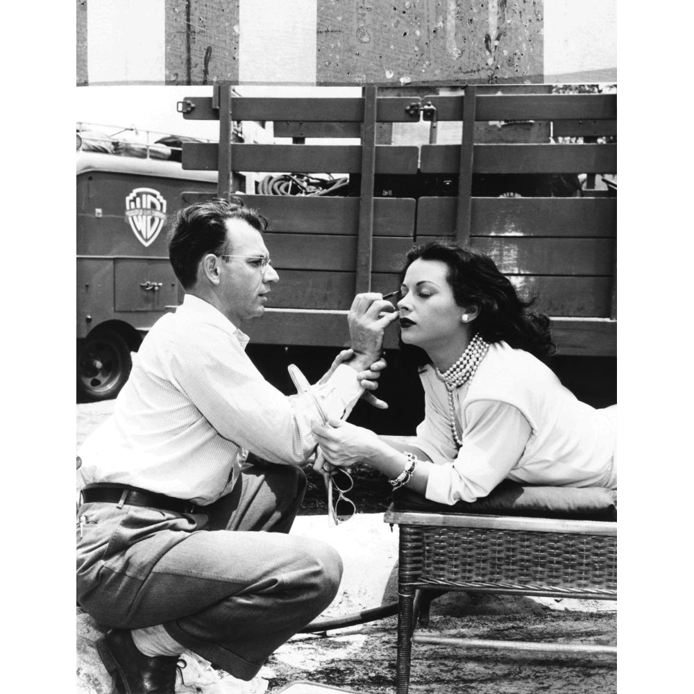 Makeup Artist Ben Nye Applying Eye Makeup To Actress Hedy Lamarr Who Observes In A Mirror. Ca. 1940S. Image 1