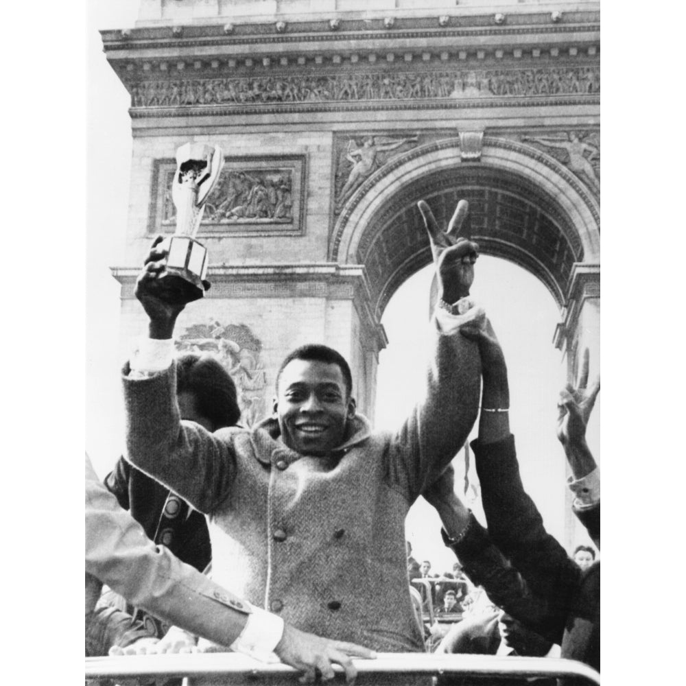 Brazilian Soccer Star Pele Waves The Jules Rimet Cup From An Open Car On Paris Champs Elysees. March 30 History Image 2