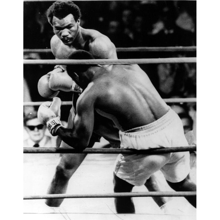 George Foreman- The Boxer Knocking Joe Frazier Down In The Second Round. Kingston History Image 1