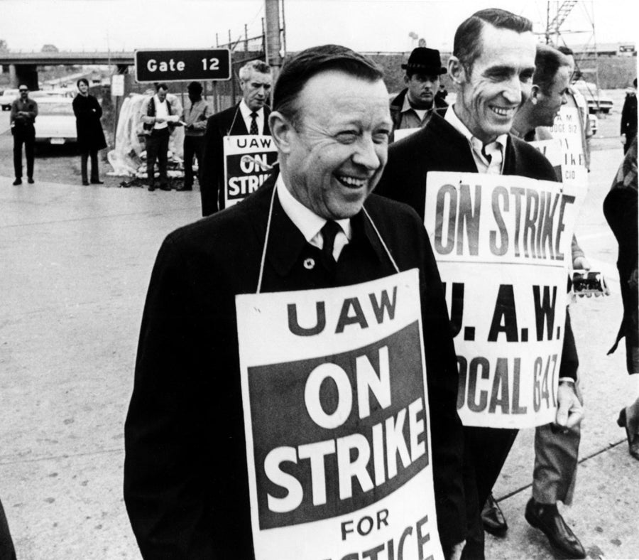 Walter Reuther- National President Of The United Auto Workers Marched The Picket Line For A Time This Afternoon At Image 1