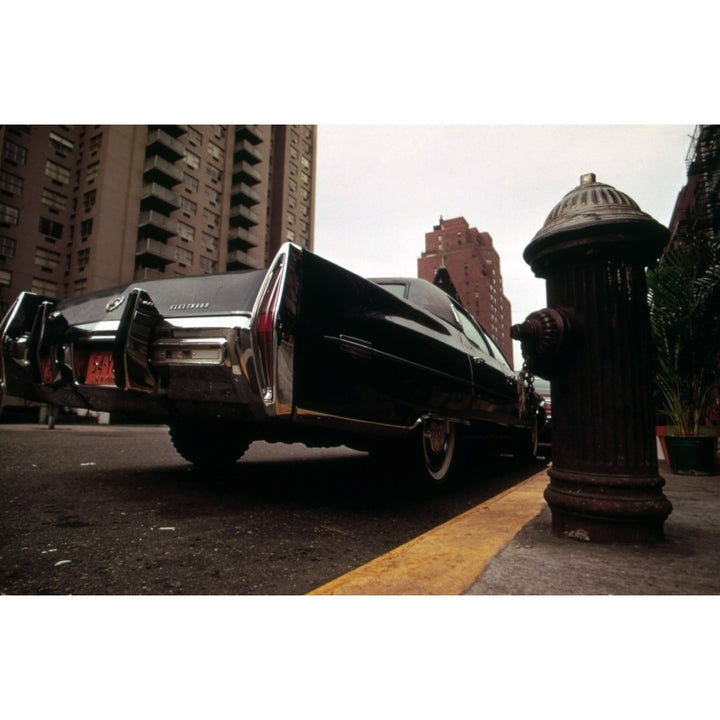 1970S America. A Cadillac Fleetwood Parked Illegally In A Fire Lane. Manhattan History Image 1