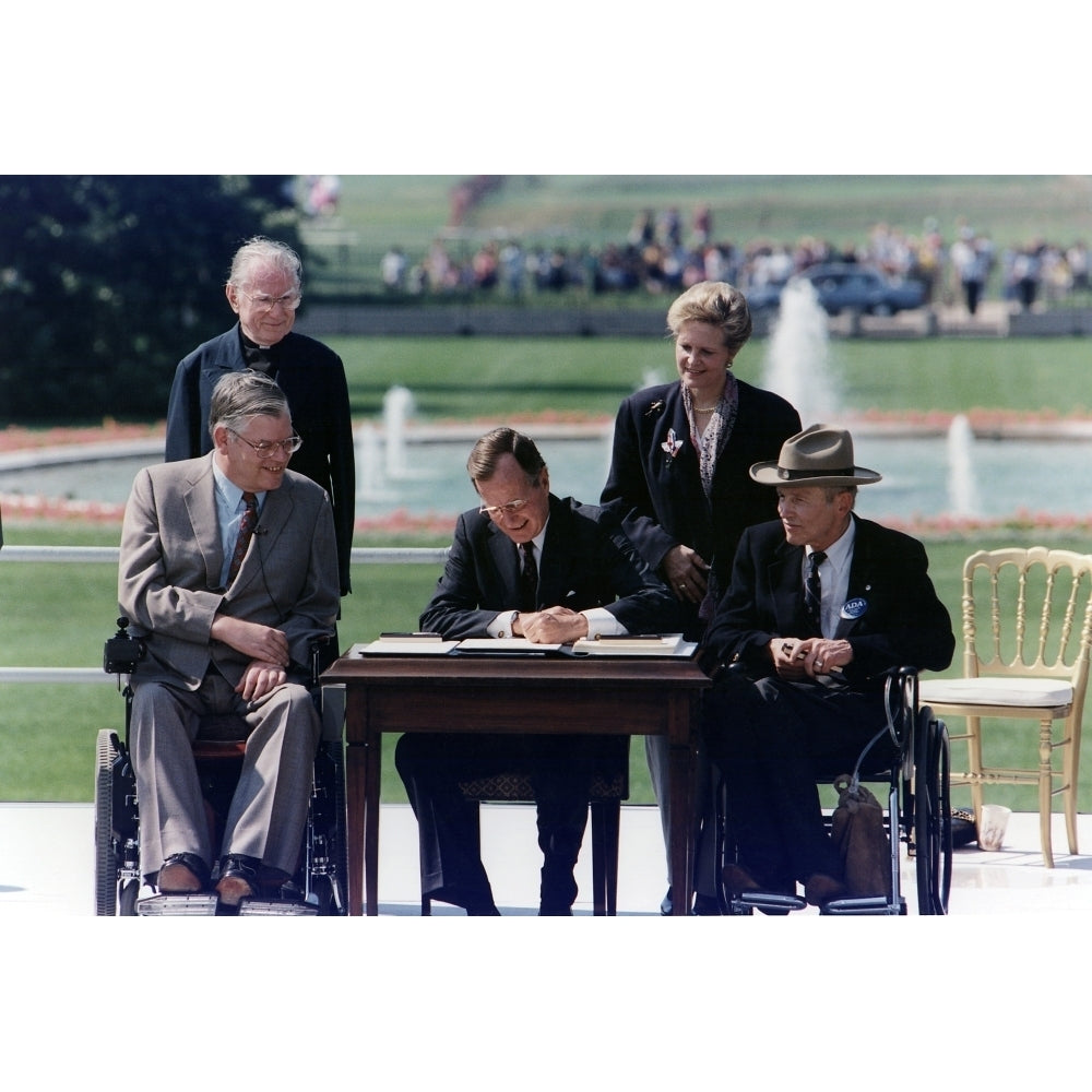 President Bush Signs Into Law The Americans With Disabilities Act Of 1990 On The South Lawn Of The White House. Image 1