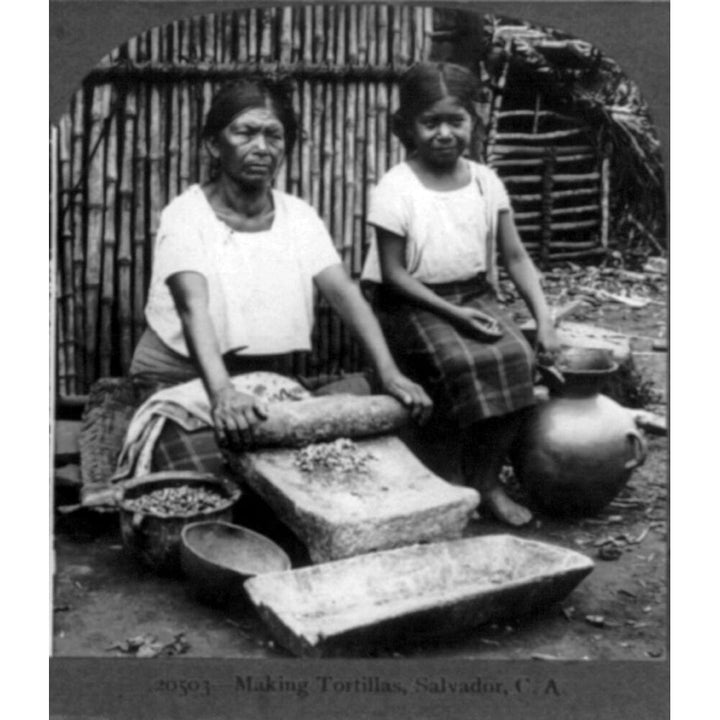 Grinding Corn For Tortillas With A Metate In The Streets Of Guadalupe History Image 1