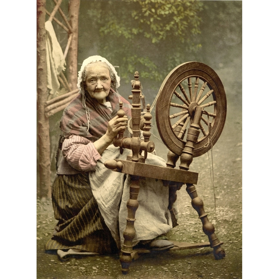 Elderly Irish Spinner Working Outdoors At Her Spinning Wheel In The Late 19Th Century. While Picturesque History Image 1