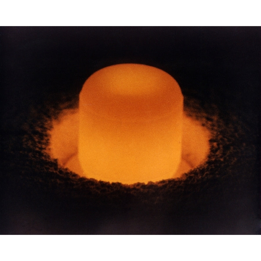 Pellet Of Plutonium-238 Glowing From Its Own Heat. Plutonium-238 Is Used To Fuel Space Probes As A Sustained Power Image 1