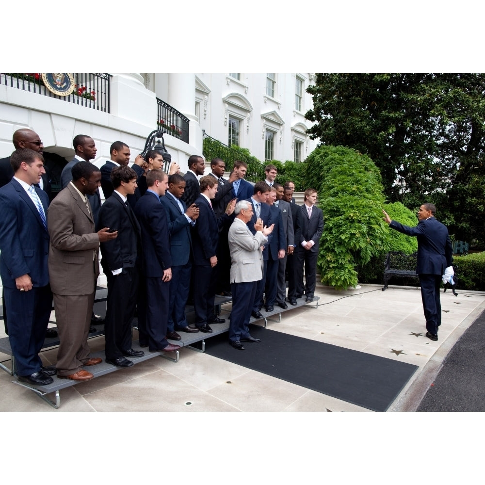 President Barack Obama Waves To Coach Roy Williams And The University Of North Carolina 2009 Ncaa MenS Basketball Image 2