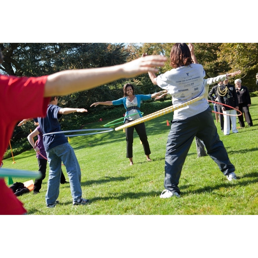 Michelle Obama Hula Hoops With Children During The Healthy Kids Fair On The South Lawn Of The White House Oct. 21 2009. Image 1