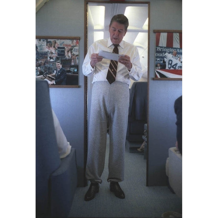 President Reagan Wearing Sweatpants With His Shirt And Tie Aboard Air Force One On A Trip To Iowa. Sept. 20 1984. Image 1