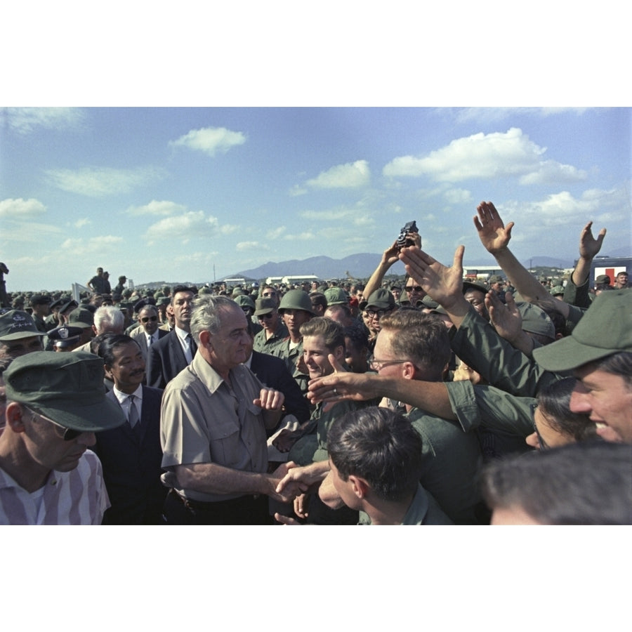 President Johnson In South Vietnam. Lbj Shaking Hands In A Large Crowd Of Troops At Cam Ranh Bay History Image 1