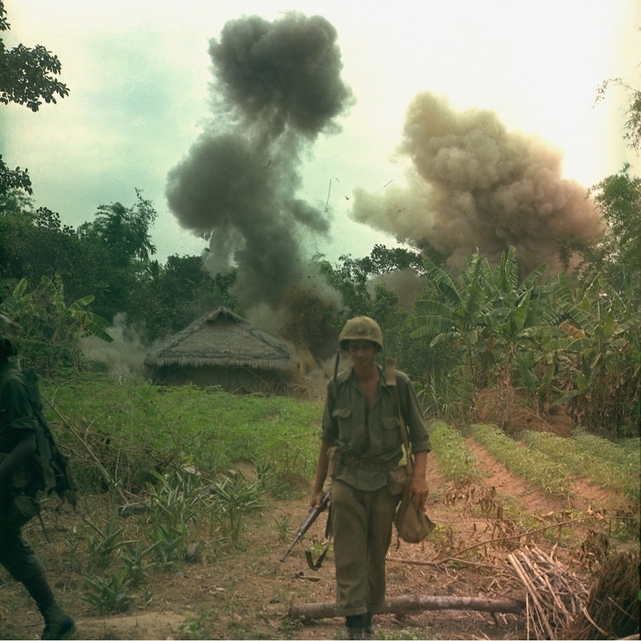 Vietnam War. Us Marines Walk Away From Blown Up Bunkers And Tunnels Used By The Viet Cong. The Action Took Place During Image 1