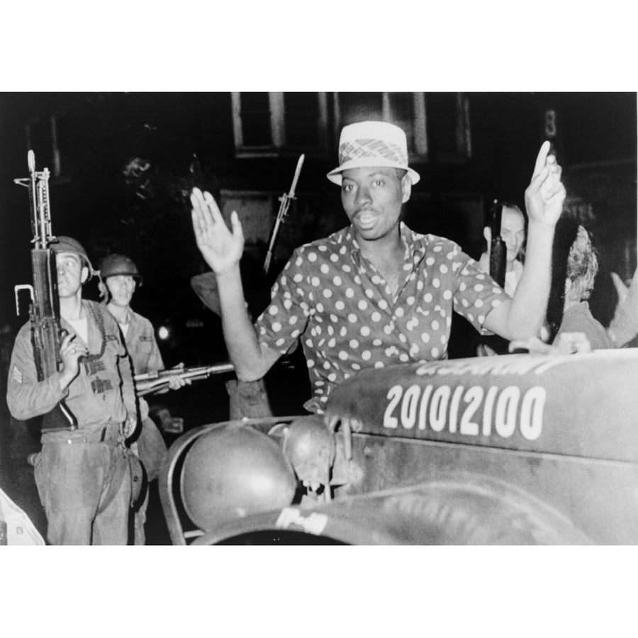 African American Man With Arms Raised In The Riot-Torn Hough Avenue Section Of Cleveland History Image 1