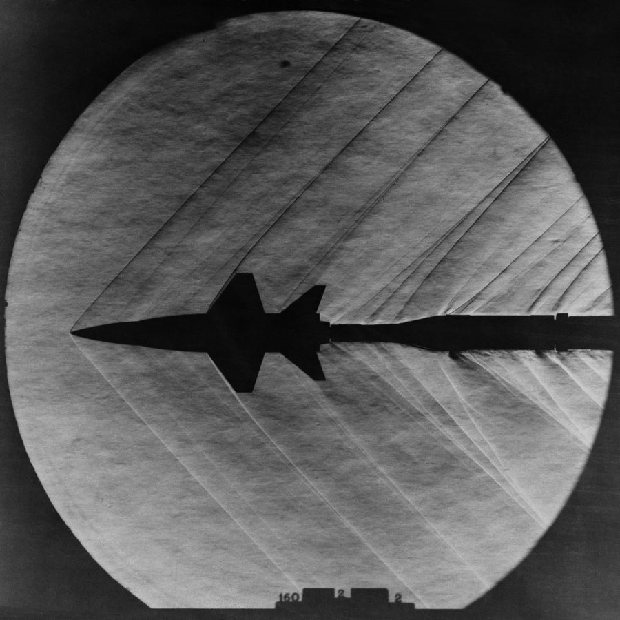 Supersonic Shocks Waves Attached To A Small Scale Model Of The X-15 Experiment Rocket Plane. Mar. 23 History Image 1