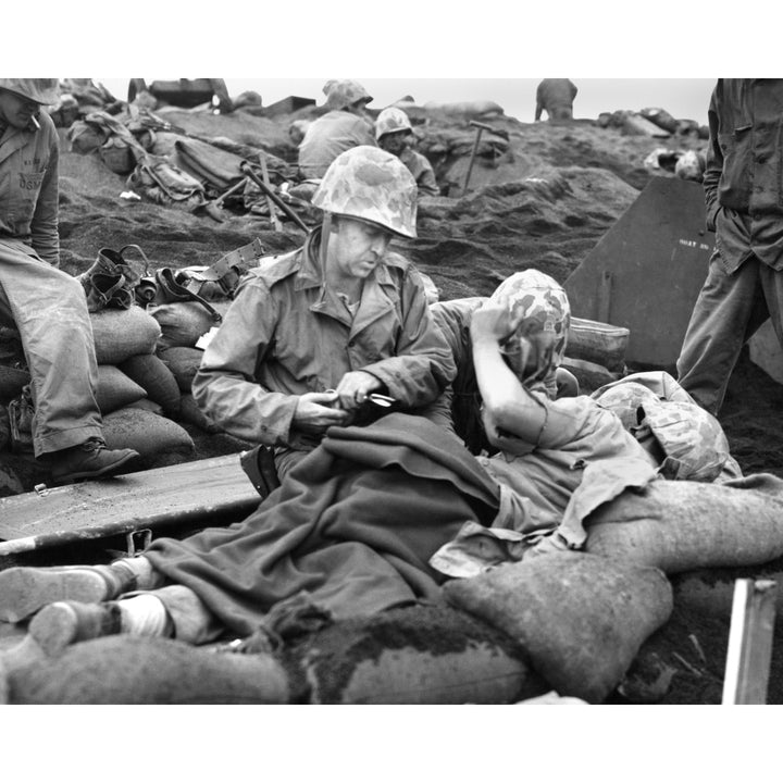 Navy Doctor And Corpsman Treat A Wounded Marine On Iwo Jima. Feb. 19-March 26 History Image 2