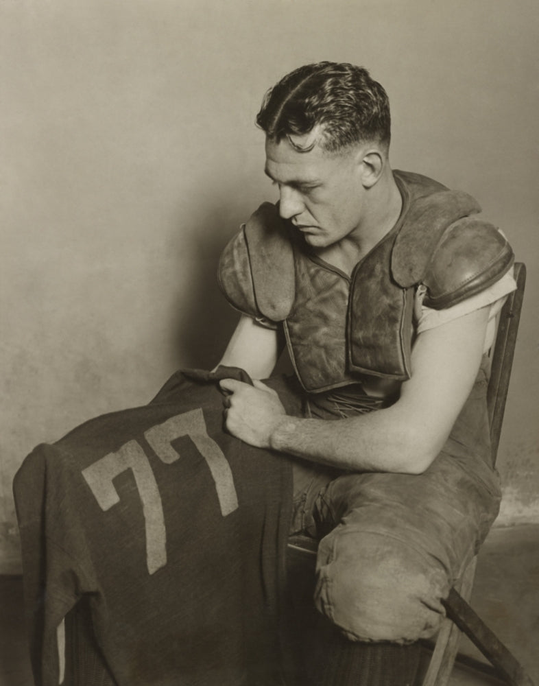 Harold Red Grange Holding His Football Jersey Number. His Number 77 Was Retired At The University Of Illinois In 1925. Image 1