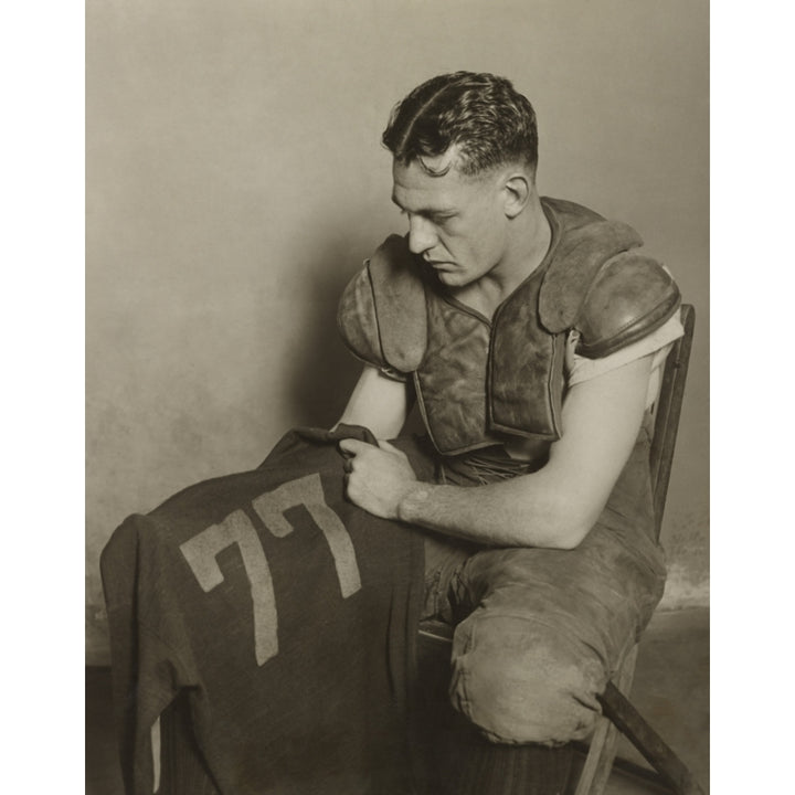 Harold Red Grange Holding His Football Jersey Number. His Number 77 Was Retired At The University Of Illinois In 1925. Image 2