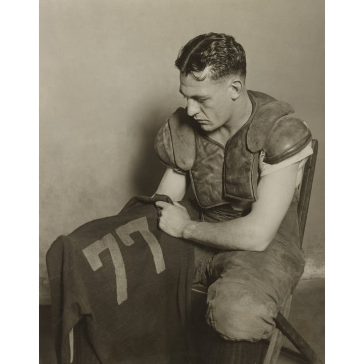 Harold Red Grange Holding His Football Jersey Number. His Number 77 Was Retired At The University Of Illinois In 1925. Image 1