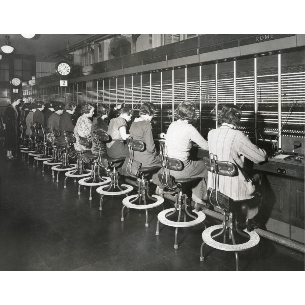 Telephone Operators Working On An International Switchboard In The 1930S. - History Image 1