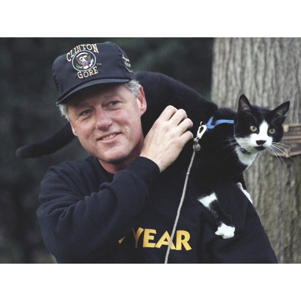 President Bill Clinton With Socks The Cat Perched On His Shoulder. March 7 History Image 1