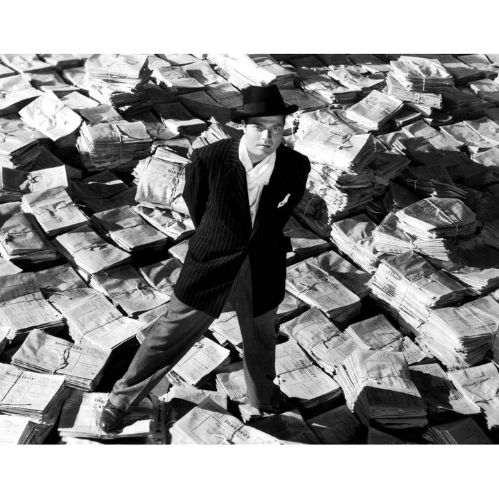 Citizen Kane Orson Welles 1941 Astride Stacks Of Newspaper Photo Print Image 1