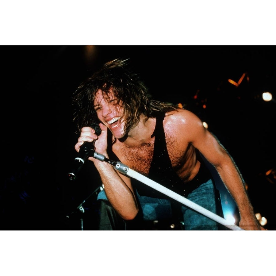 Jon Bon Jovi performing with Bon Jovi in concert 1980s. ph: Ron Wolfson / Poster Print Image 1