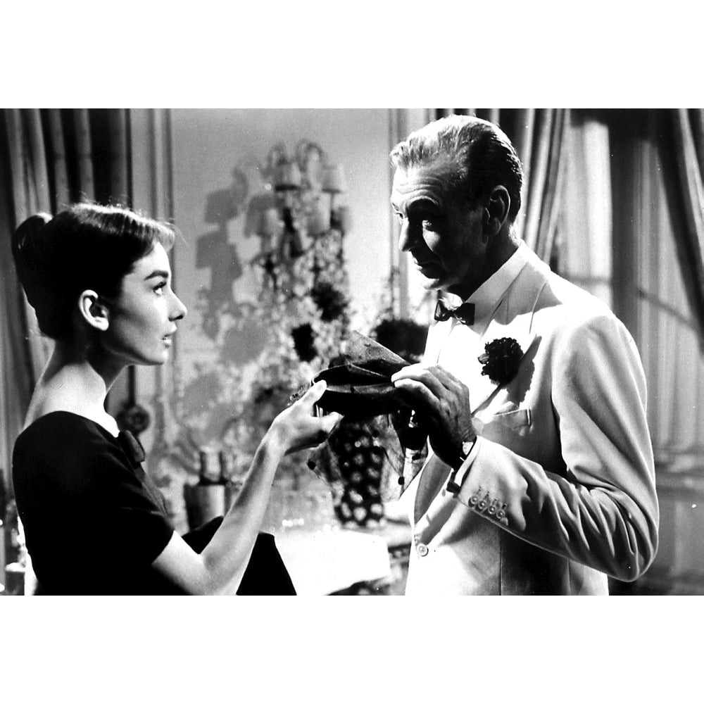 A film still of Audrey Hepburn and Gary Cooper in Love In The Afternoon Photo Print Image 2