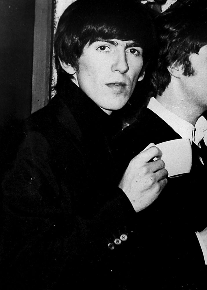 George Harrison holding a teacup Photo Print Image 1