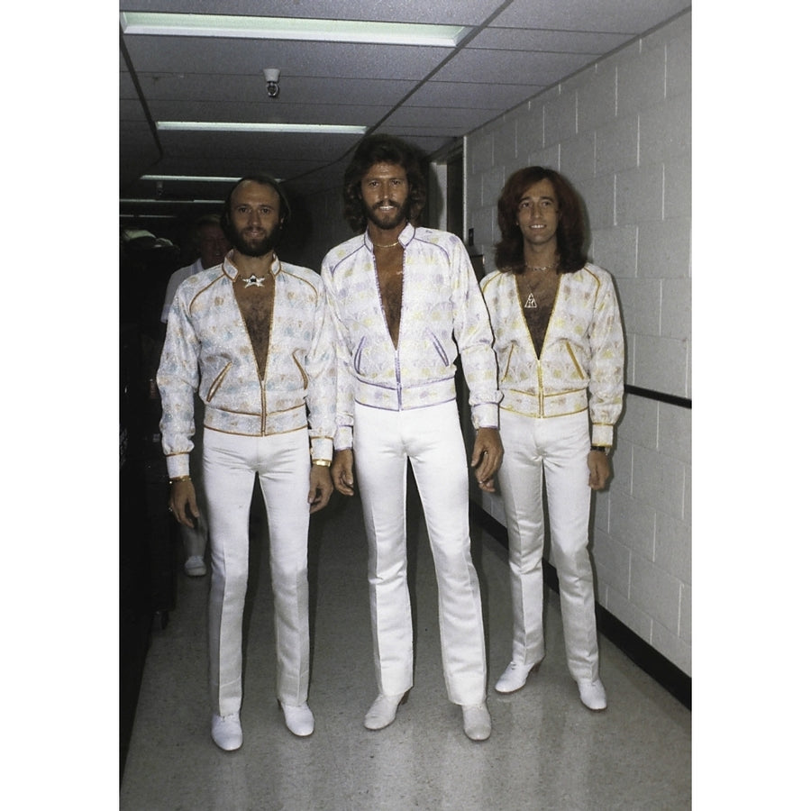 the Bee Gees wearing white costumes Photo Print Image 1