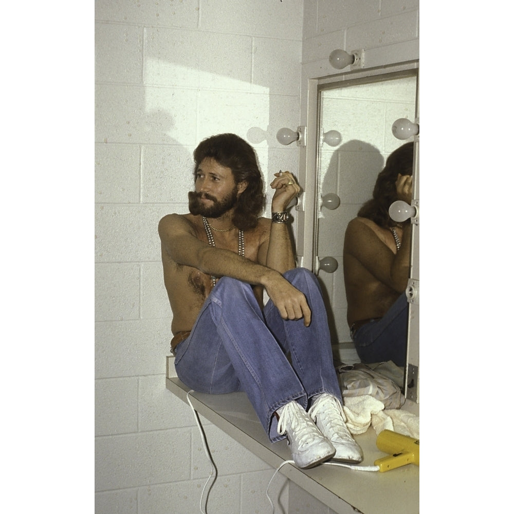 Barry Gibb sitting by a mirror Photo Print Image 1