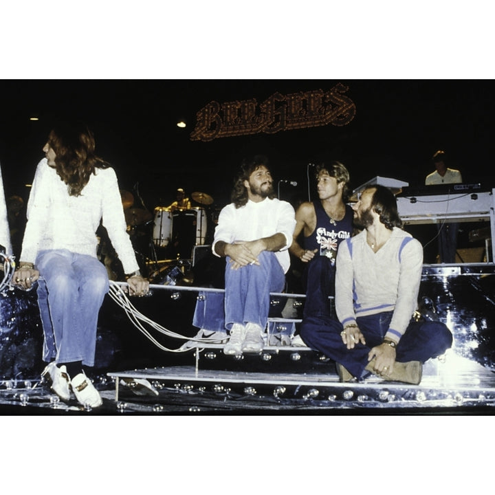 the Bee Gees sitting on stage Photo Print Image 1