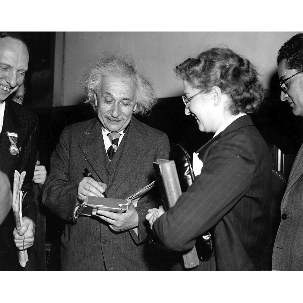 Albert Einstein signing an autograph Photo Print Image 2