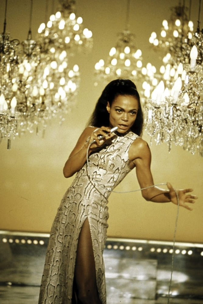 Eartha Kitt singing with chandeliers in the background Photo Print Image 1