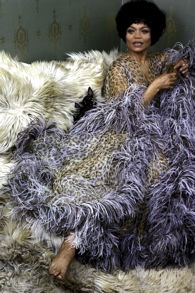 Eartha Kitt wearing a faux and animal print robe Photo Print Image 1