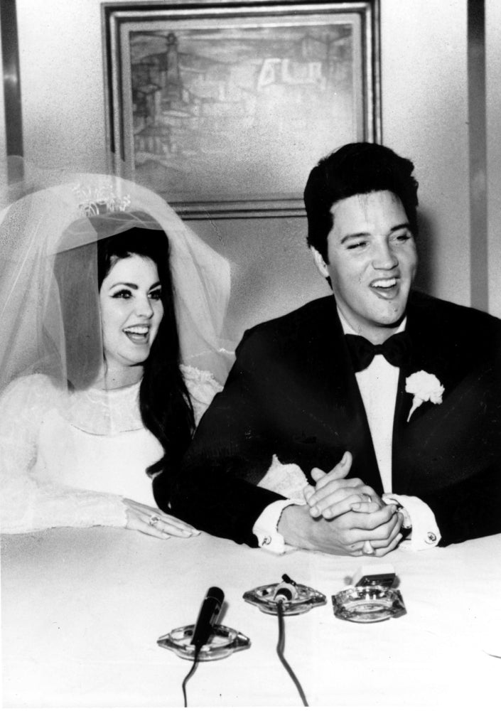 Elvis and Priscilla Presley smiling at their wedding Photo Print Image 1