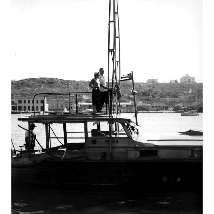 Ernest Hemingway on a boat Photo Print Image 1